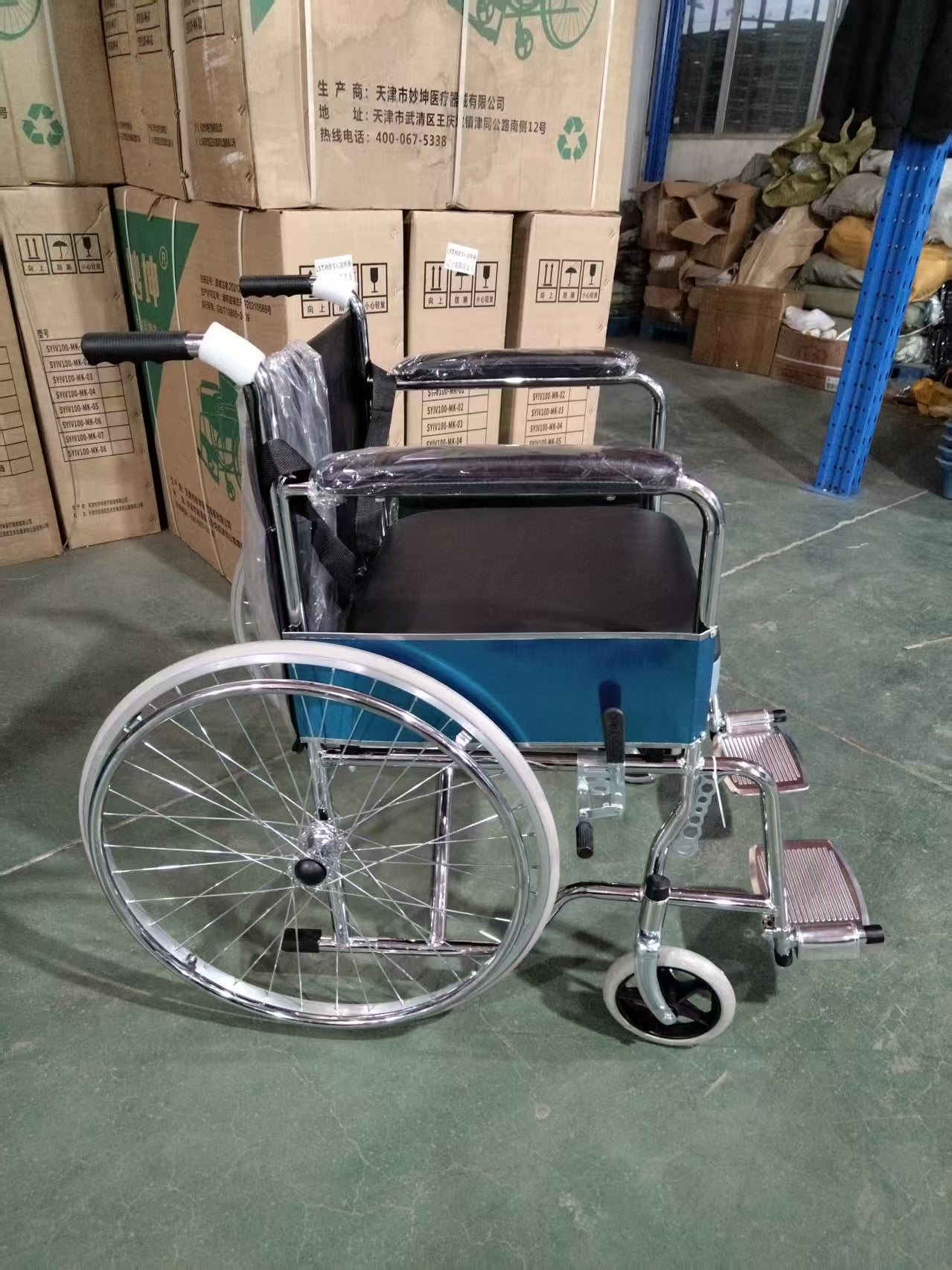 Electric Wheelchair with Integral Seat Plate, Leather Commode Pan & Solid Tires