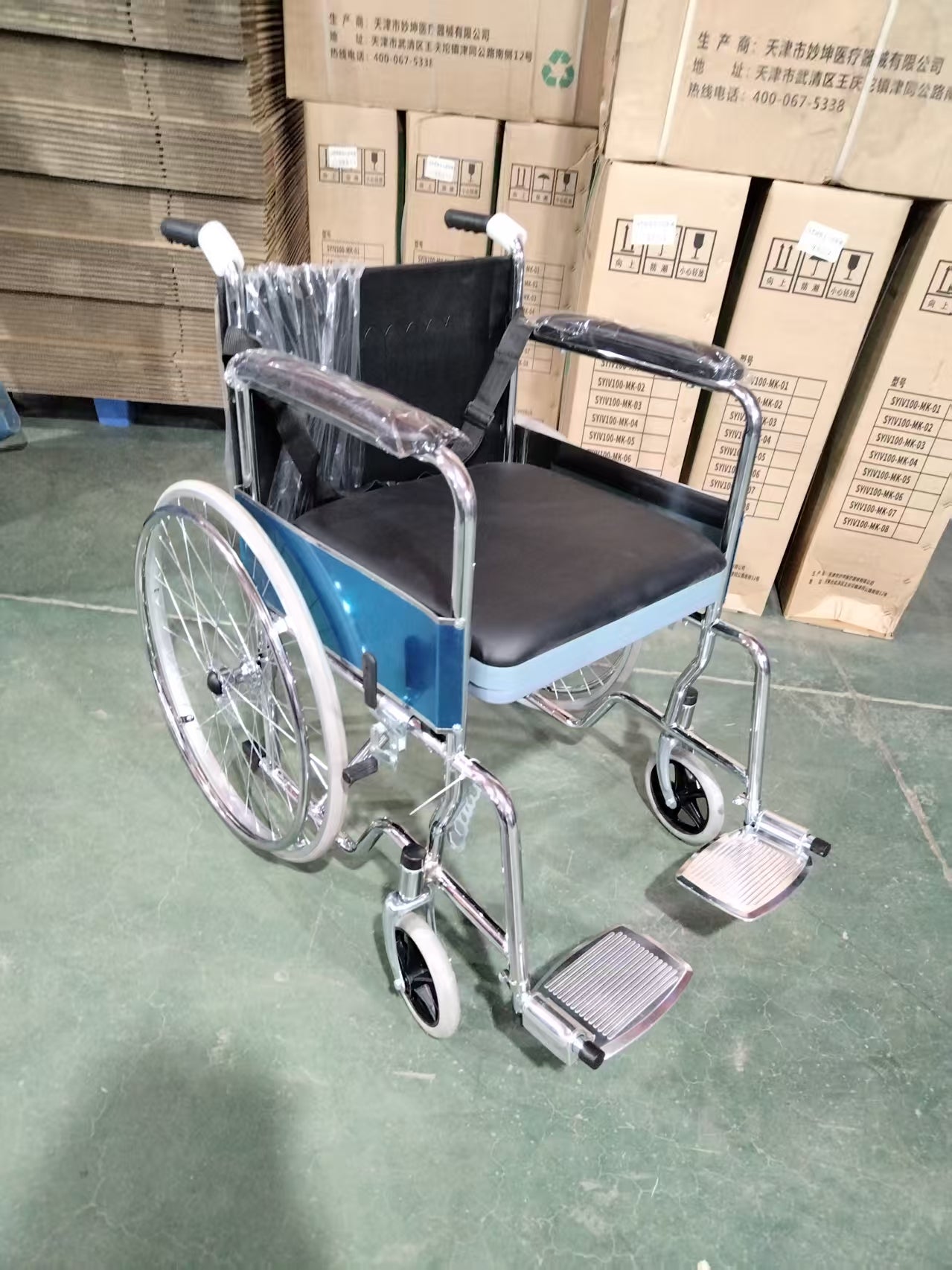 Electric Wheelchair with Integral Seat Plate, Leather Commode Pan & Solid Tires