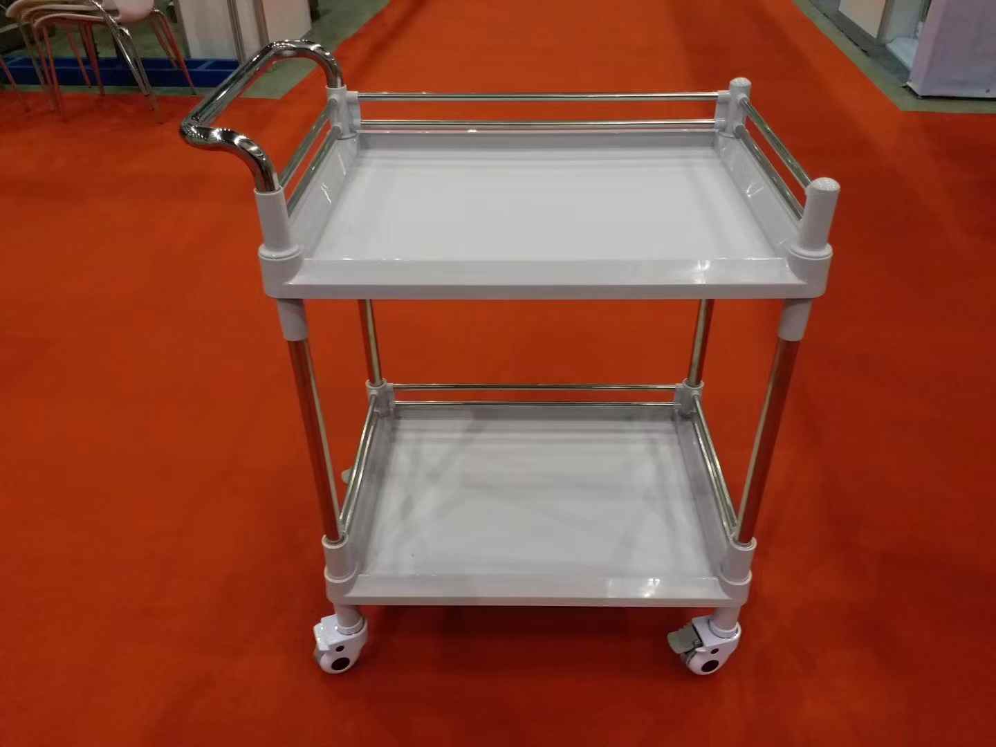 ABS plastic trays + stainless steel columns, with front curved push handle, suitable for clinics and beauty salons.